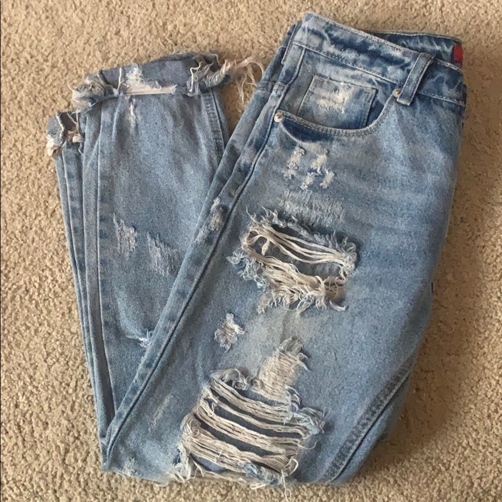 Distressed light wash denim